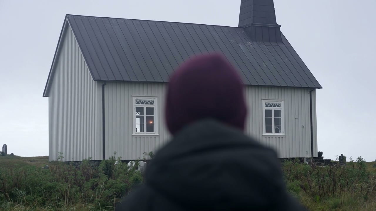 Person Walking to Strandarkirkja Church, Iceland