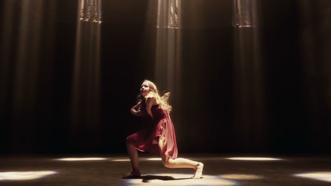 Solo Dancer Performing Under Spotlights • Stock Video on Uppbeat