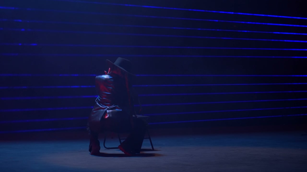 Woman Chair Dance Performance Under Lasers • Stock Video on Uppbeat