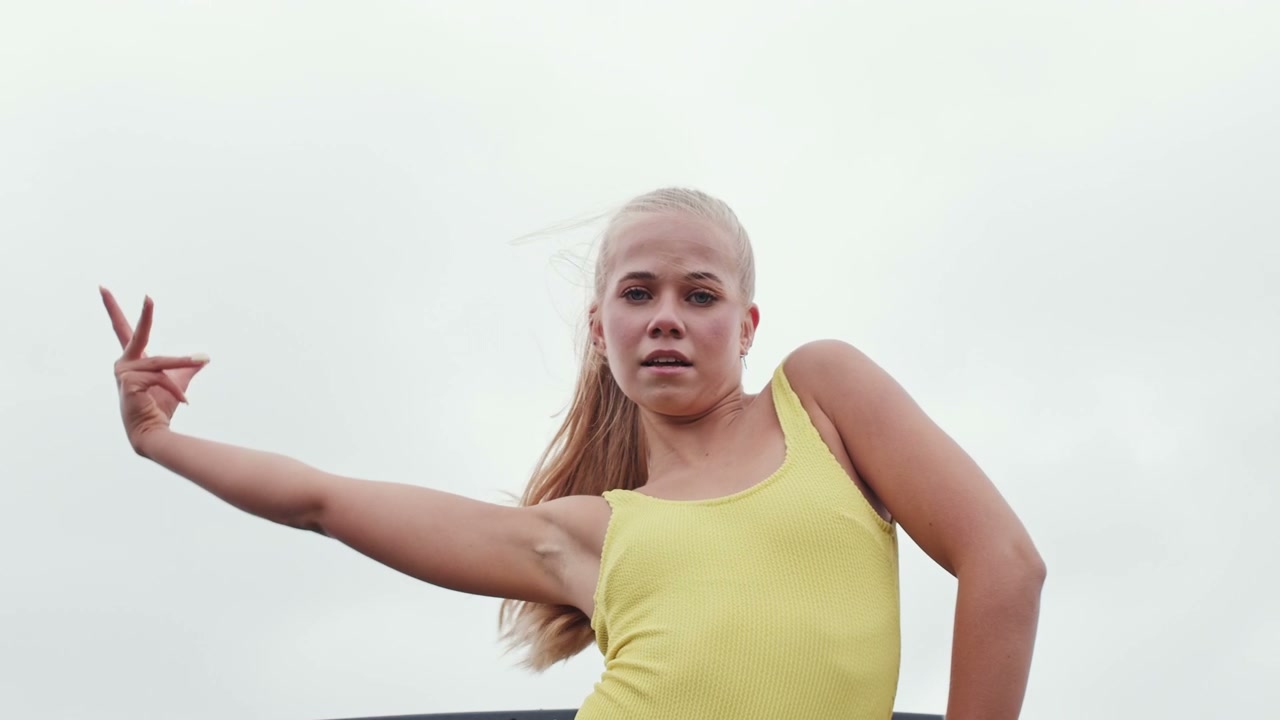 Female Dancer on Bus Roof