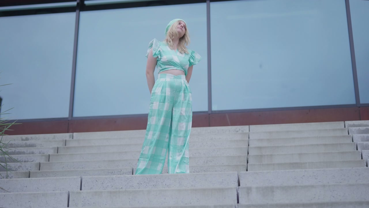 Fashion Model Posing on Outdoor Stairs