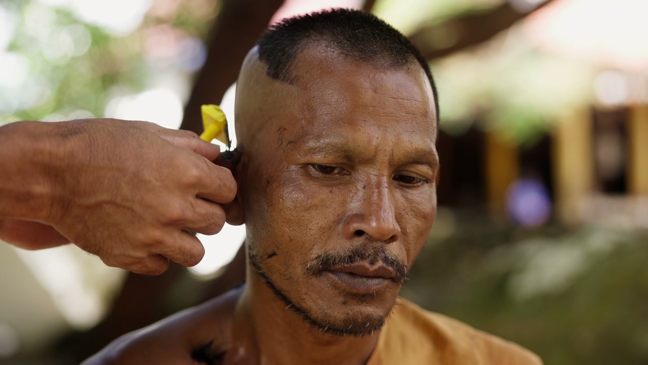 Buddhist Monk Head Shaving Ceremony