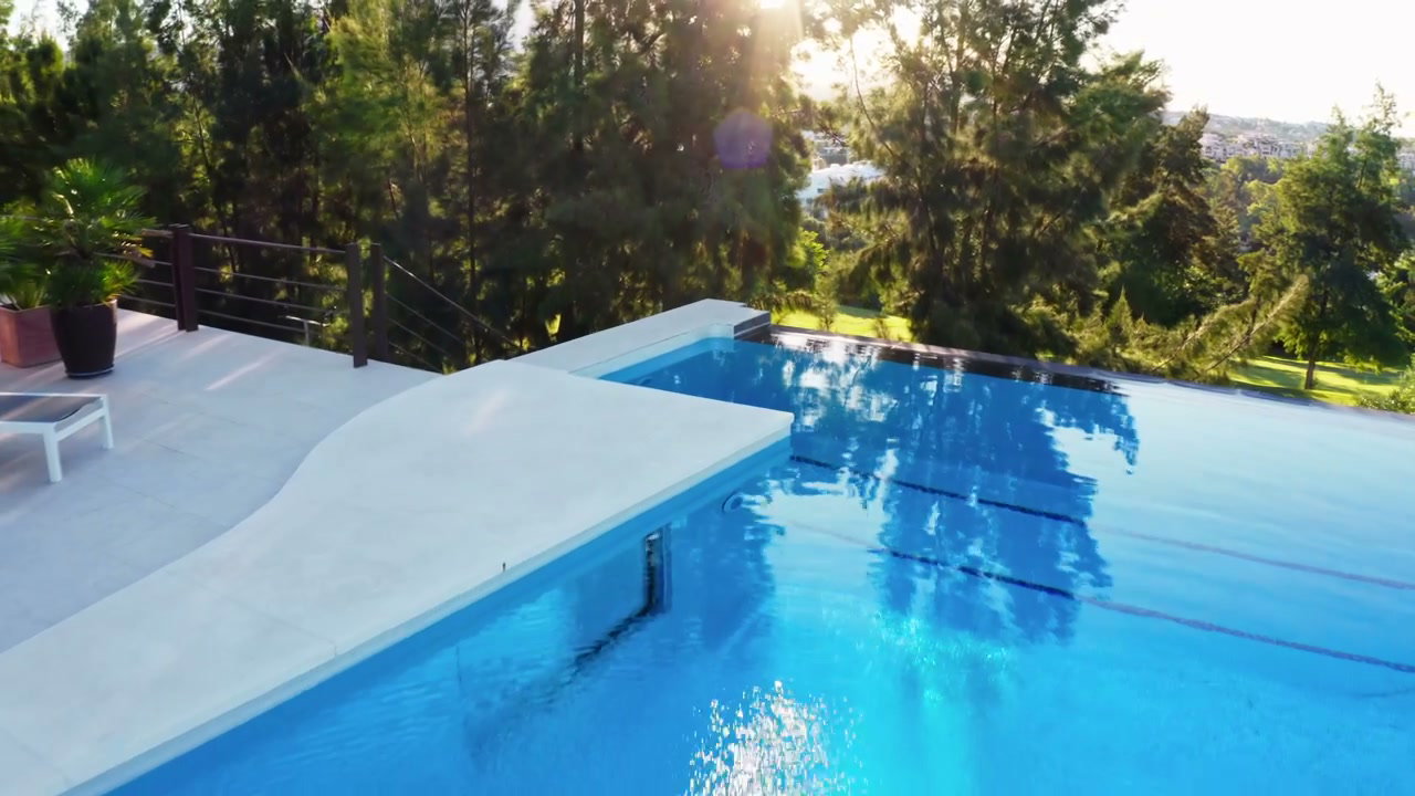 Sunrise Over Modern Infinity Pool