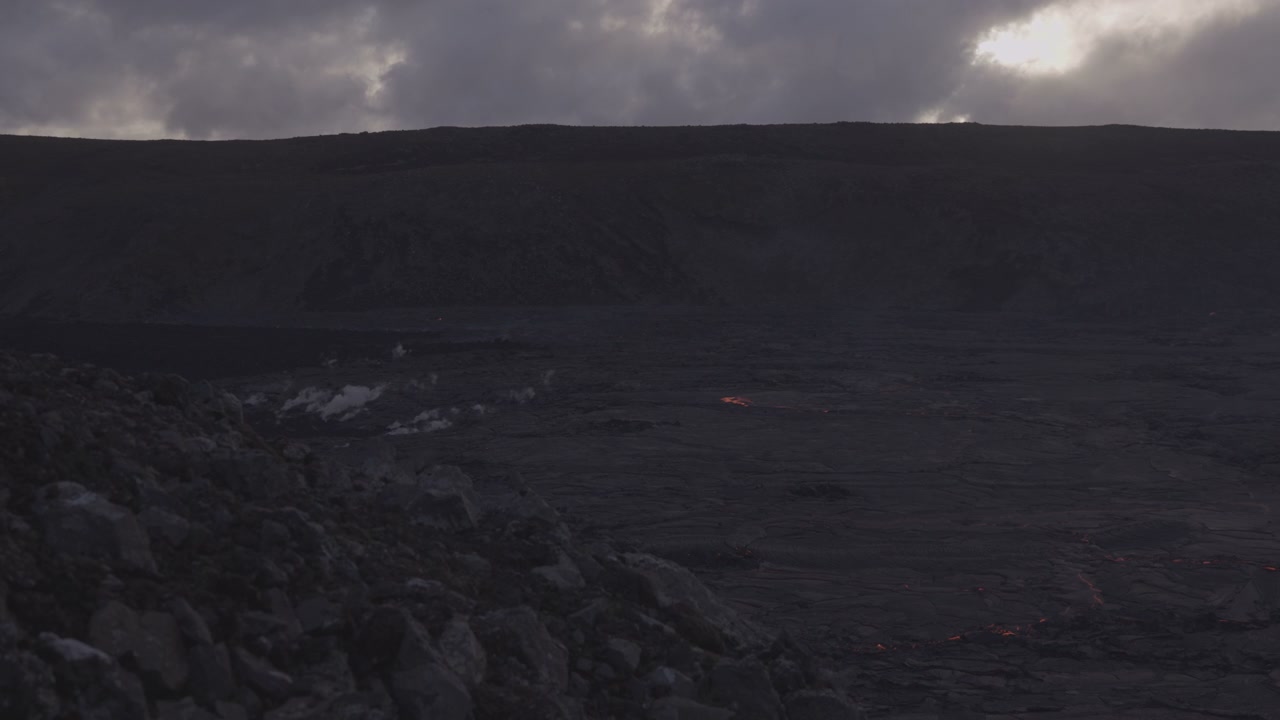 Icelandic Lava Field and Distant Volcano Eruption • Stock Video on Uppbeat