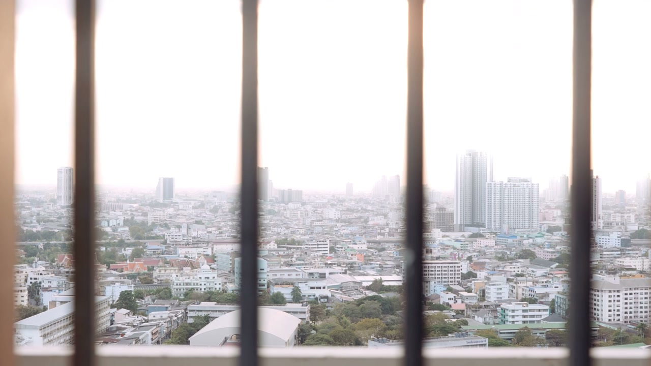 Bangkok Cityscape Through Window Bars