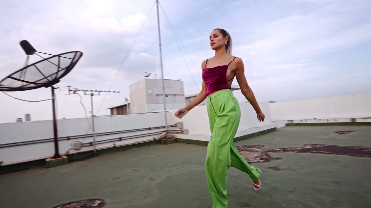 Dancers on Bangkok Rooftop with City View • Stock Video on Uppbeat