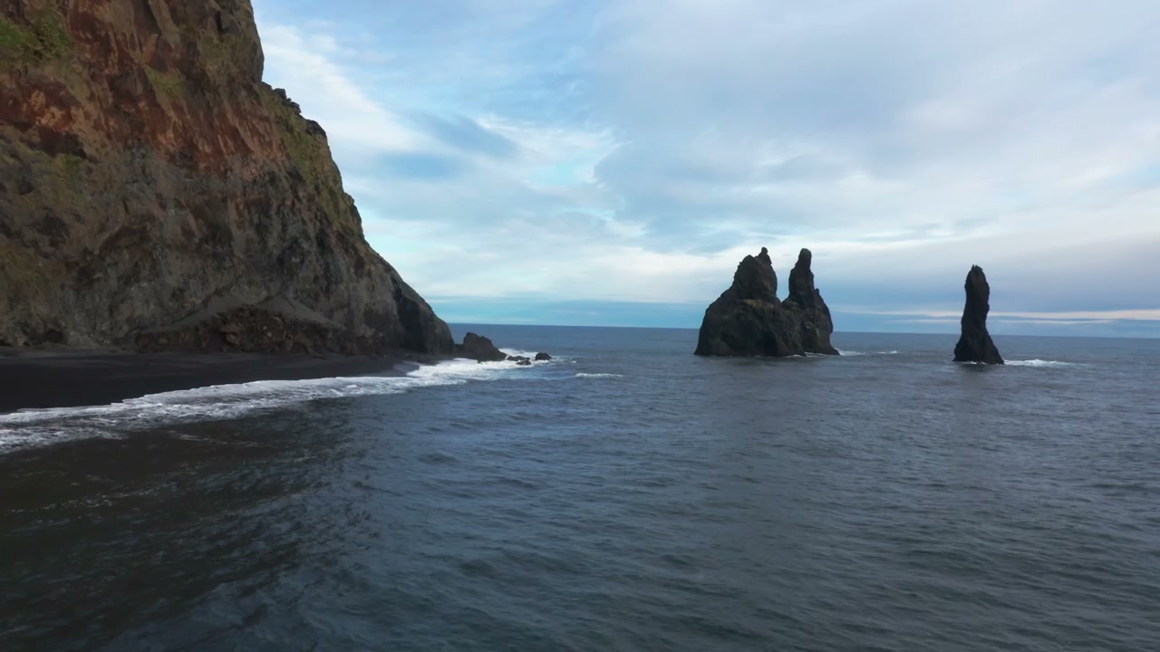 Icelandic Basalt Columns and Black Sand Beach • Stock Video on Uppbeat