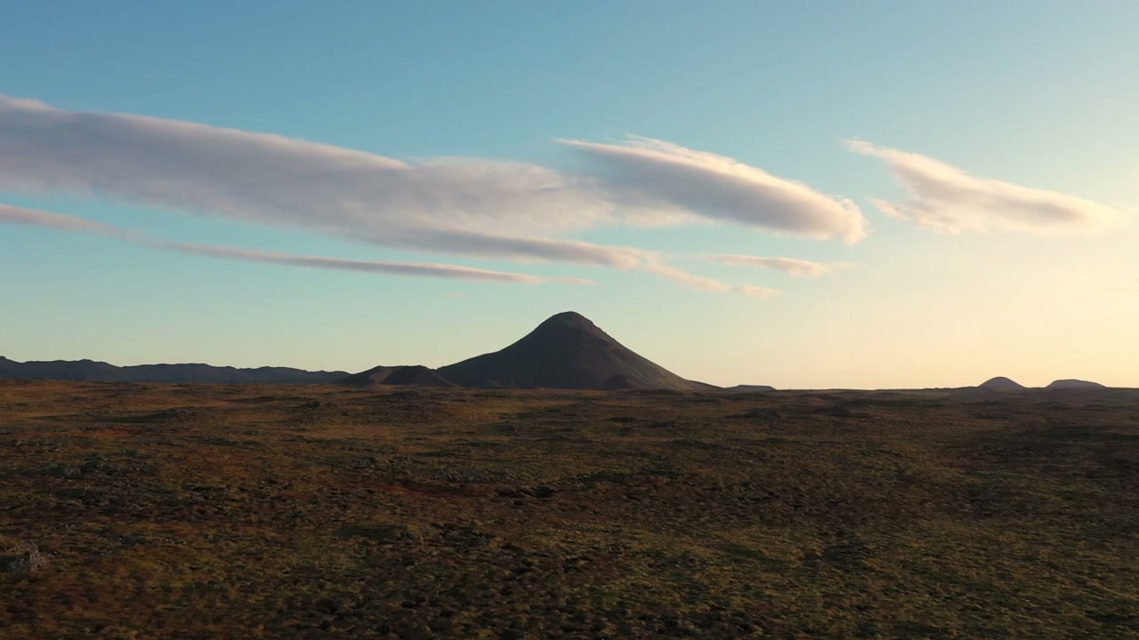 Conical Mountain in Vast Icelandic Landscape at Sunset
