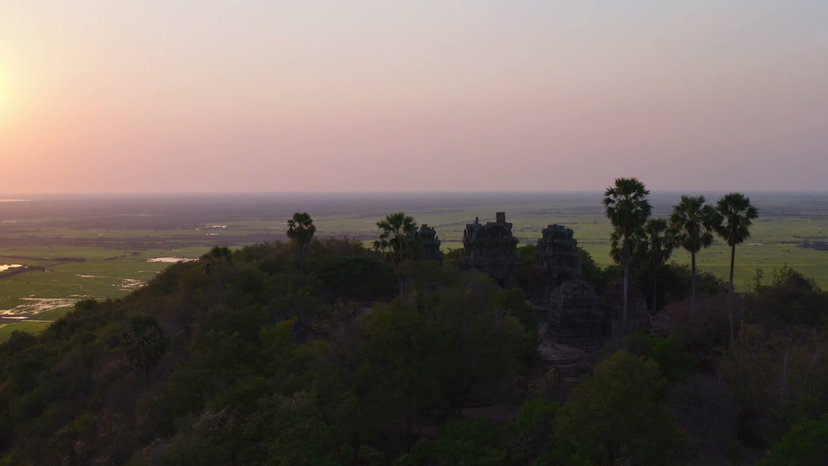 Ancient Temple Ruins Overgrown with Tree Roots • Stock Video on Uppbeat
