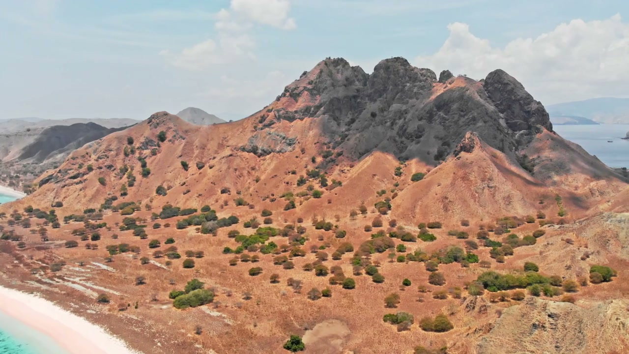 Pink Beach and Arid Island Landscape