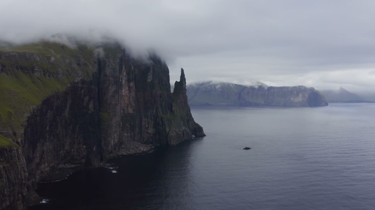Trollkonufingur Sea Stack and Coastal Cliffs