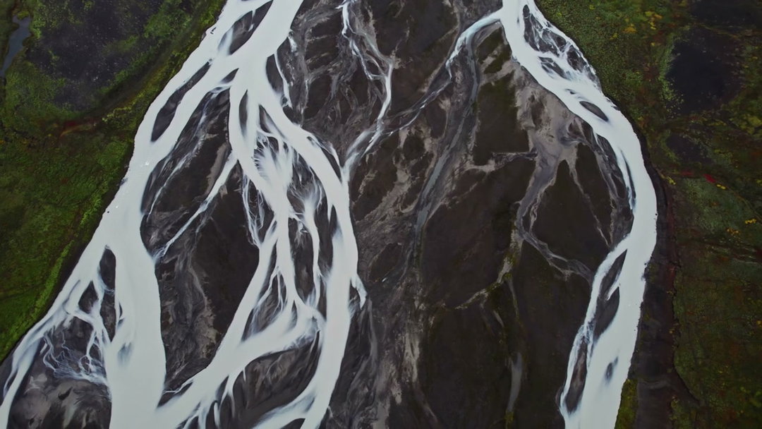 Aerial View of Braided River Landscape • Stock Video on Uppbeat