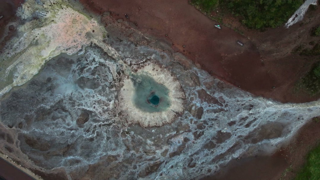 Aerial View Geothermal Field with Steaming Vents • Stock Video on Uppbeat