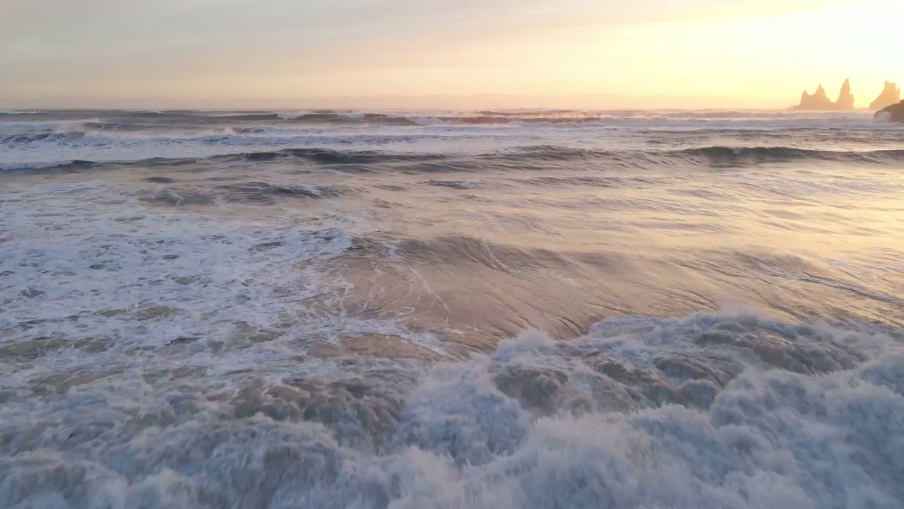 Reynisfjara Beach and Reynisdrangar Sea Stacks at Sunset • Stock Video ...