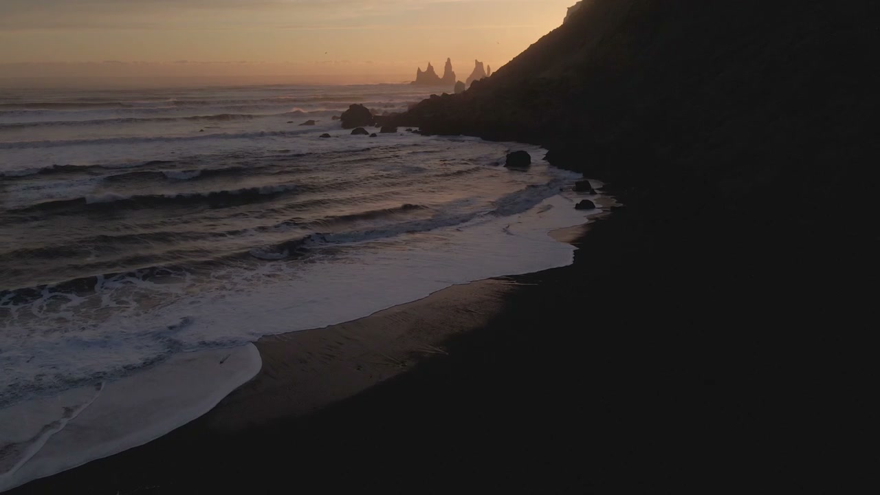 Reynisfjara Beach and Reynisdrangar Sea Stacks at Sunset • Stock Video ...