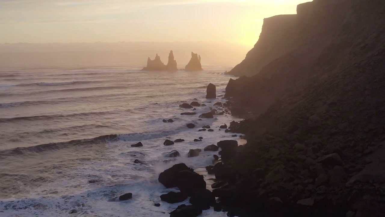 Reynisfjara Beach and Reynisdrangar Sea Stacks at Sunset • Stock Video ...