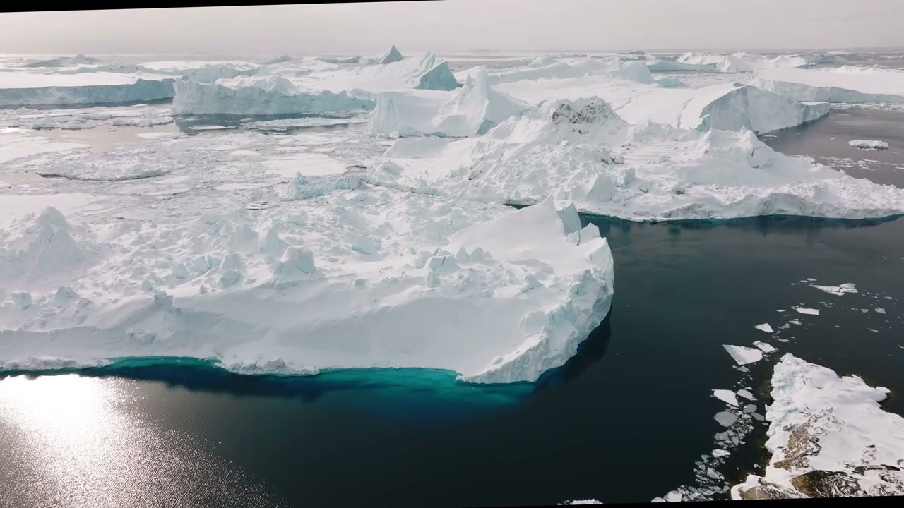 Aerial View of Ilulissat Icefjord Icebergs, Greenland • Stoc…
