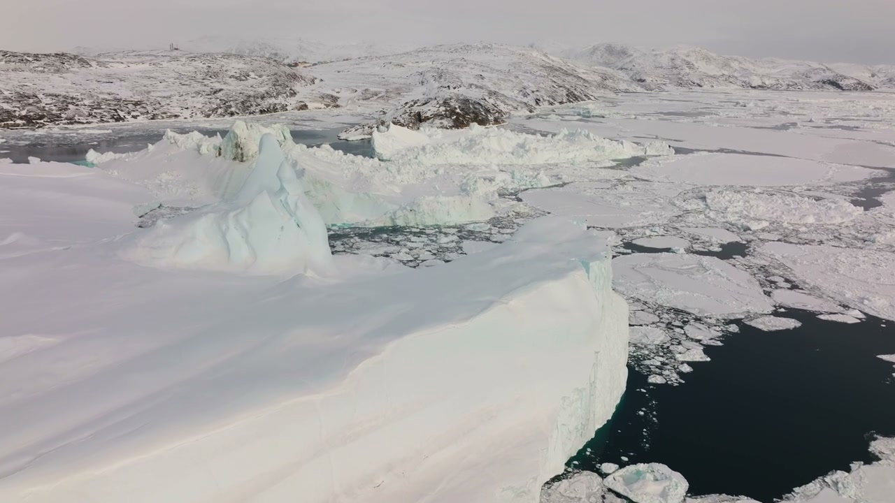 Aerial View of Ilulissat Icefjord Icebergs, Greenland • Stoc…