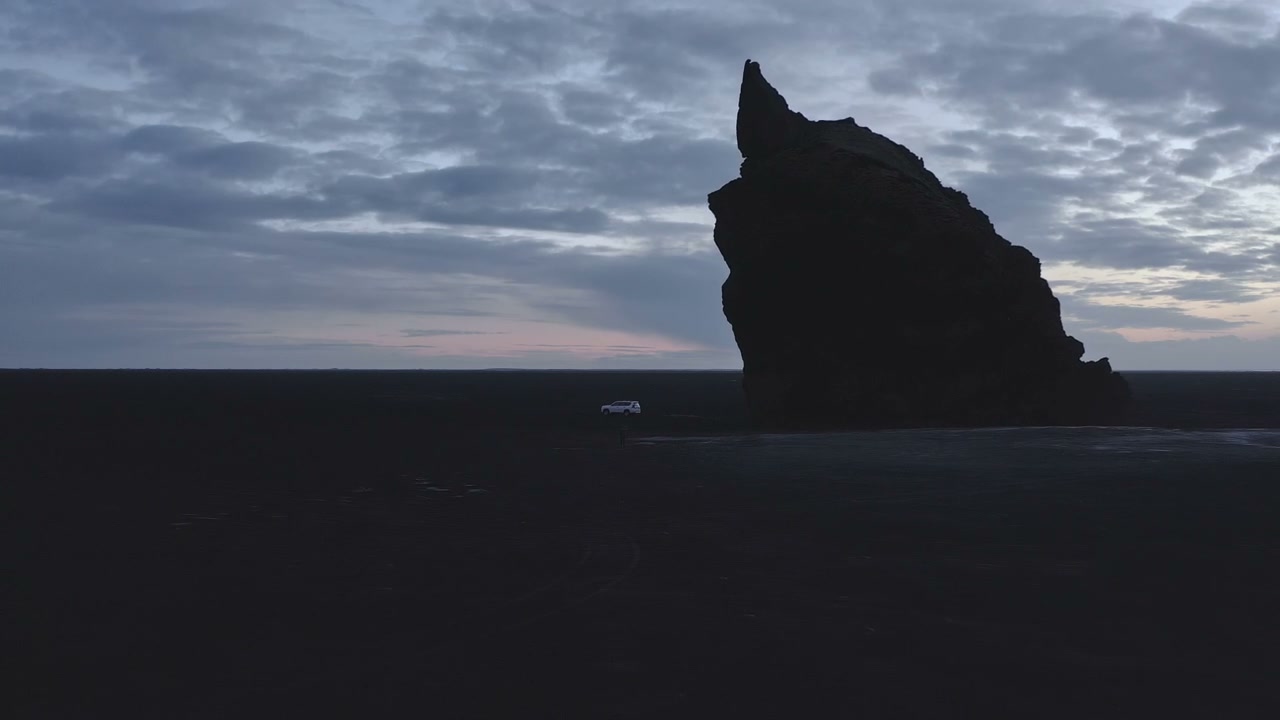 Arnar Drangur Rock on Icelandic Black Sand Beach