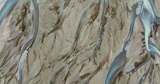 Aerial View of Braided River Landscape • Stock Video on Uppbeat