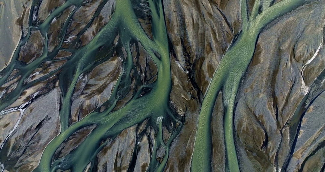 Aerial View Braided River Delta in Iceland • Stock Video on Uppbeat