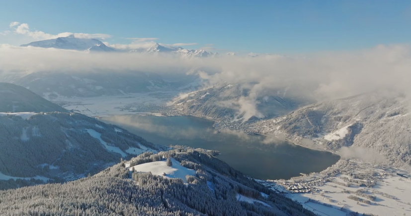 Aerial View of Austrian Lake and Mountain Town • Stock Video on Uppbeat
