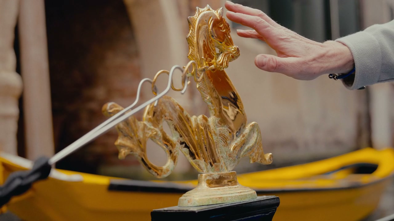 Hand Touching Golden Seahorse Gondola Ornament