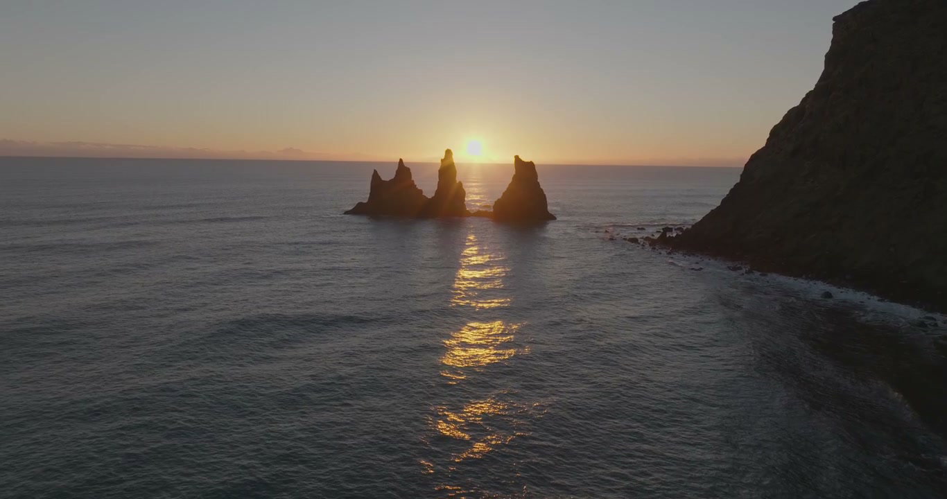 Reynisdrangar Sea Stacks at Sunset in Iceland • Stock Video on Uppbeat