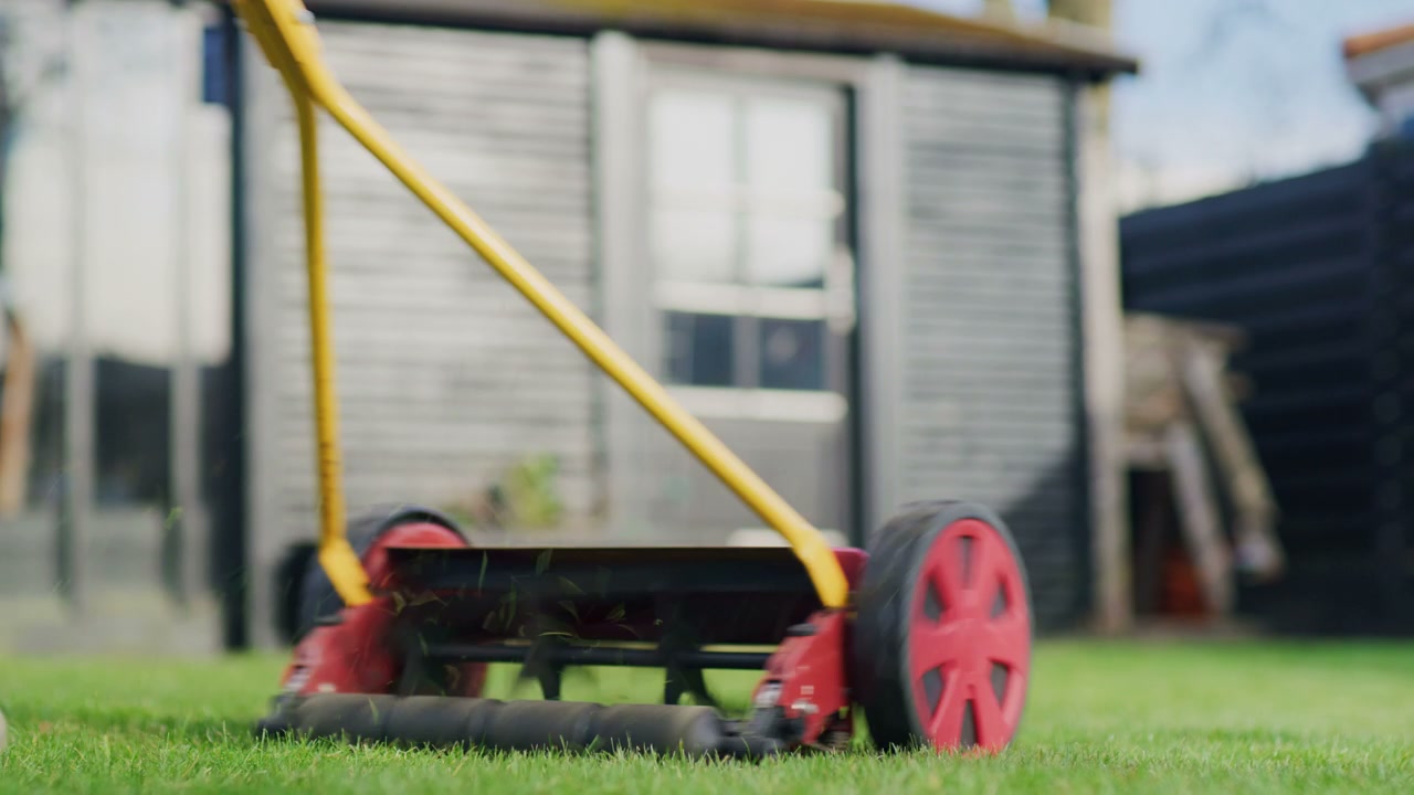 Reel Lawnmower Cutting Grass