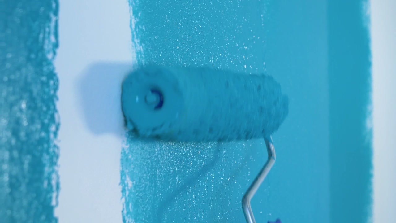 Hand Painting a Wall Blue