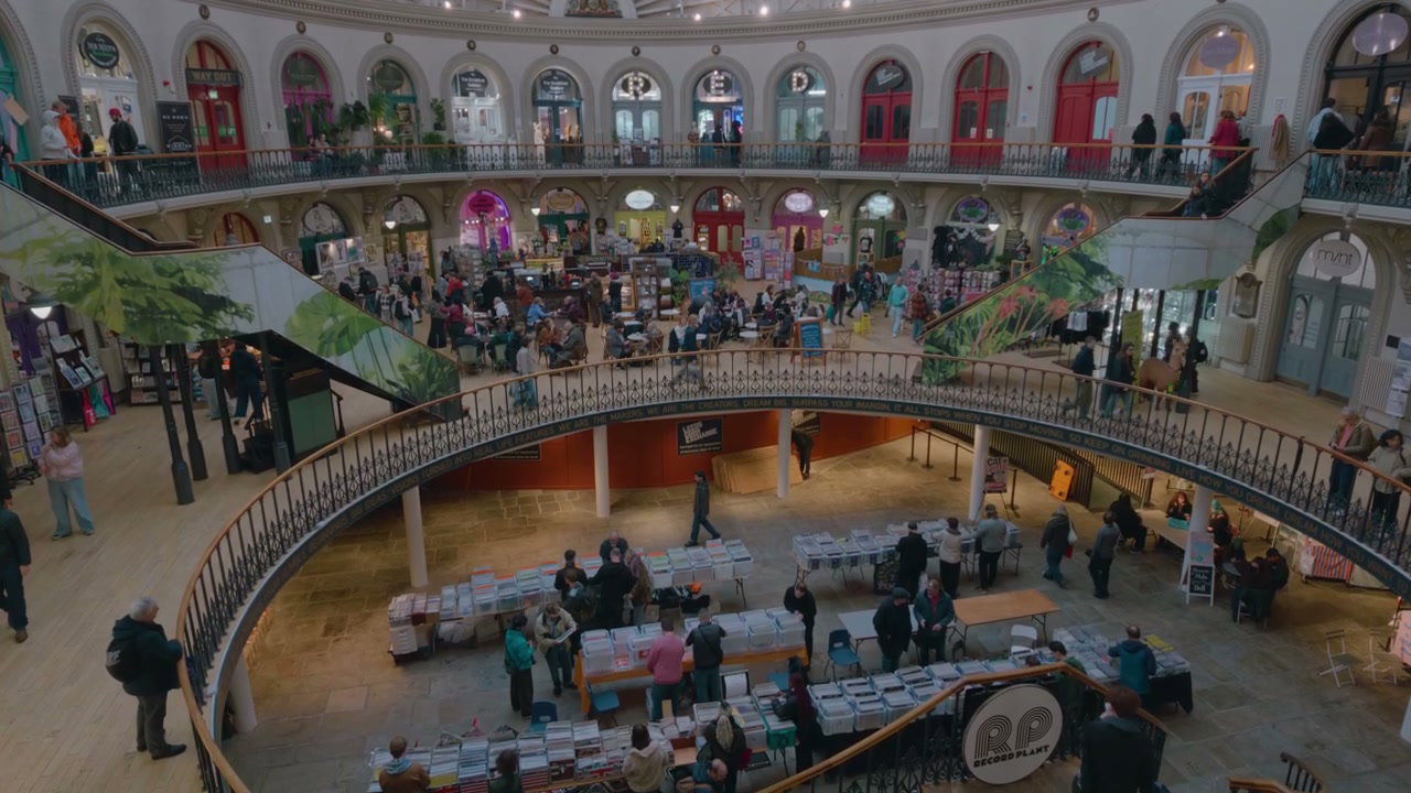 Busy Indoor Market Hall with Shoppers