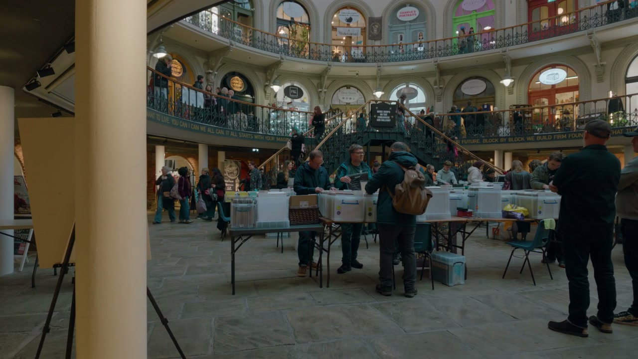 People Browsing Indoor Market Fair in Leeds