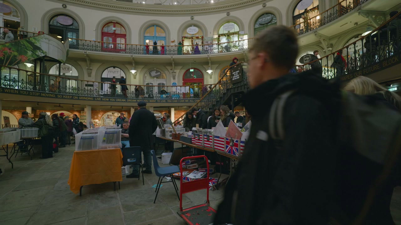 People Browsing Vinyl Records at Indoor Market