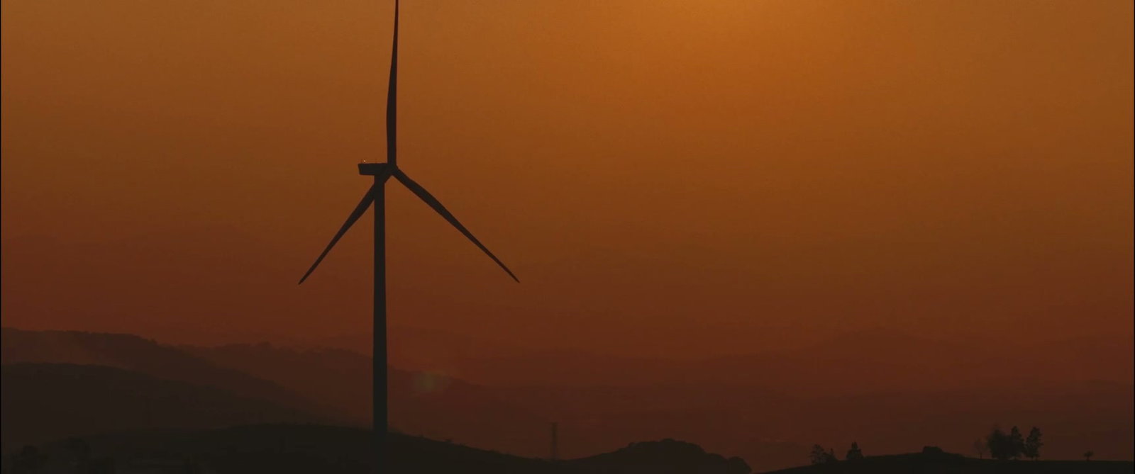 Wind Turbine Silhouette at Golden Hour Sunset • Stock Video on Uppbeat