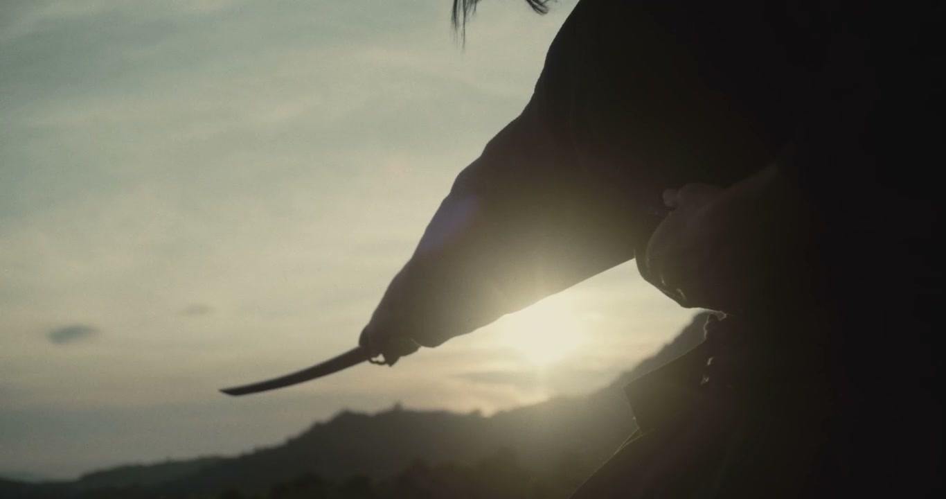 Samurai Drawing Katana at Sunset