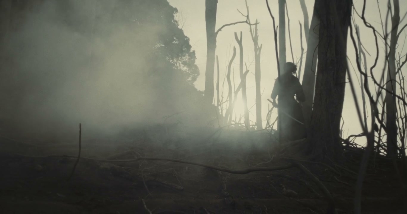 Samurai Draws Katana in Misty Forest