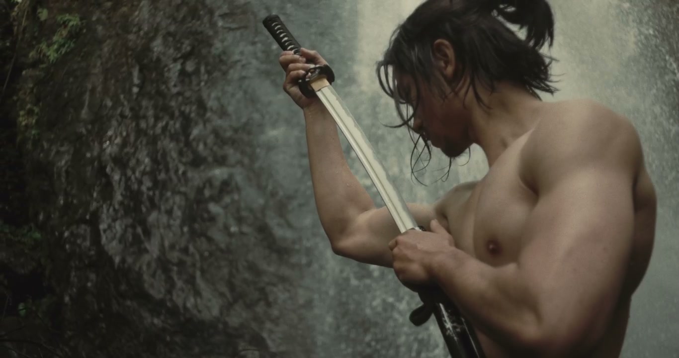 Samurai Warrior Sheathing Katana by Waterfall