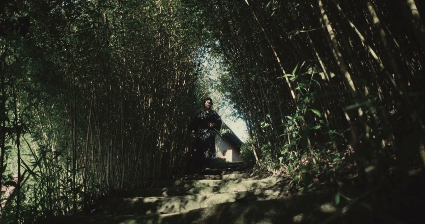Samurai Walking Through Bamboo Forest Path