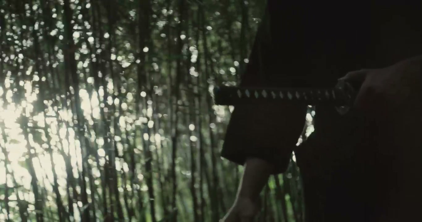 Samurai Drawing Katana in Bamboo Forest