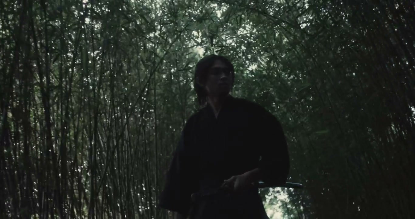 Samurai Drawing Katana in Bamboo Forest