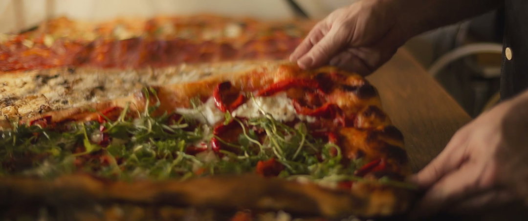 Italian Pizza al Taglio in Display Case • Stock Video on Uppbeat