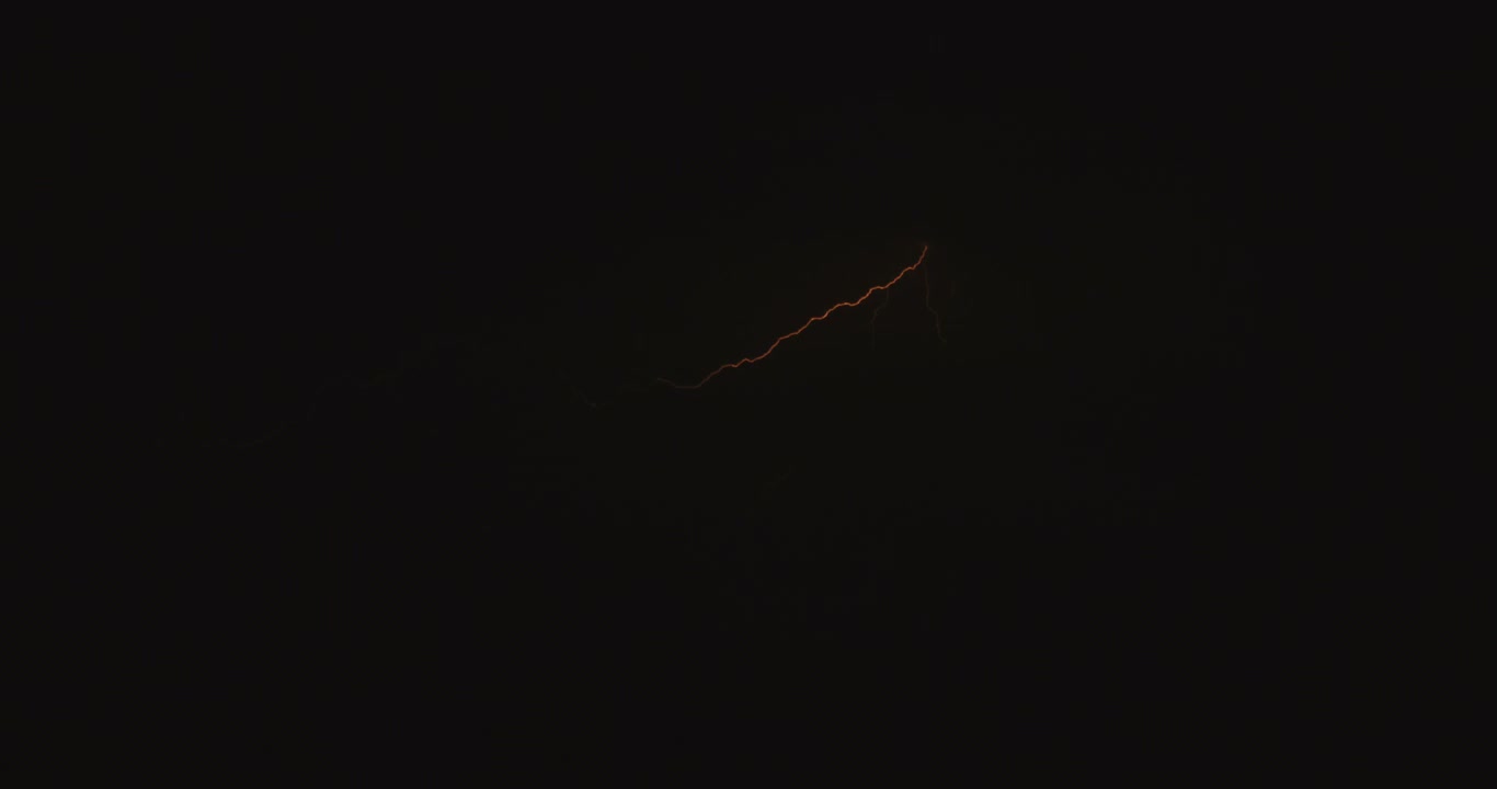 Lightning Flash in Dark Sky