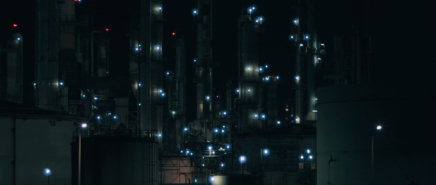 Industrial Plant at Night with Bright Lights • Stock Video on Uppbeat