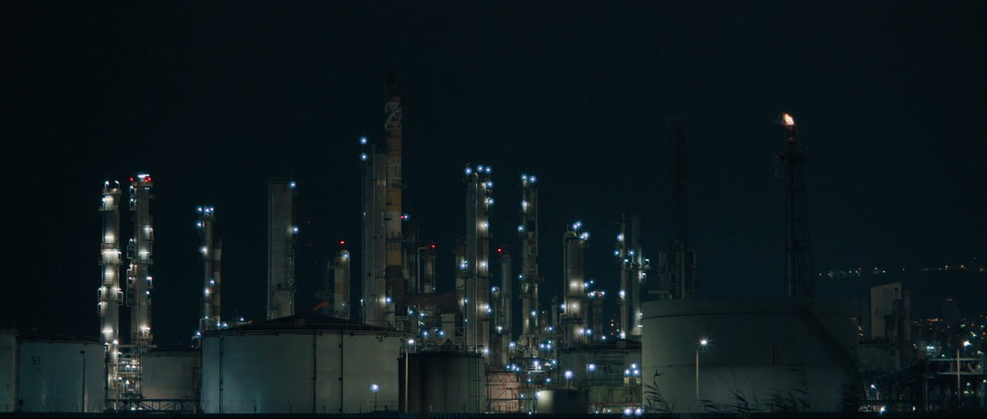 Industrial Plant at Night with Bright Lights • Stock Video on Uppbeat