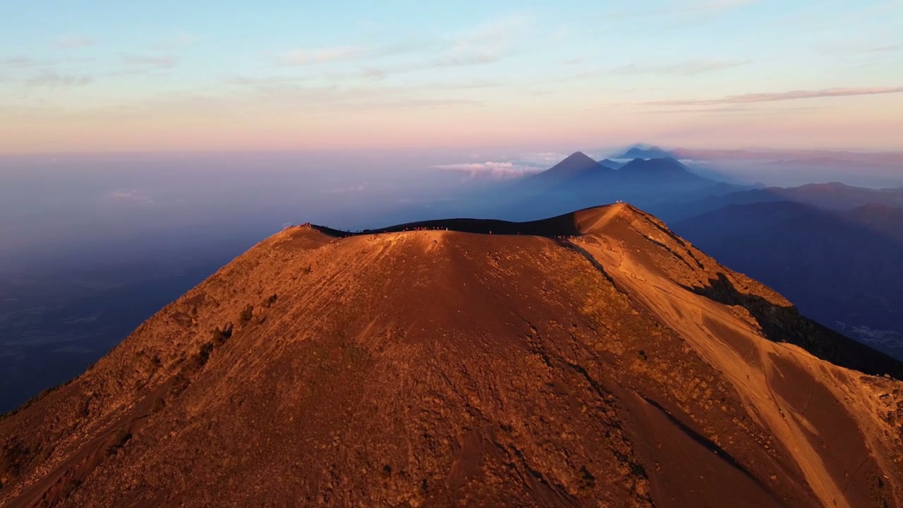 Hikers on Acatenango Volcano Ridge at Sunrise • Stock Video on Uppbeat