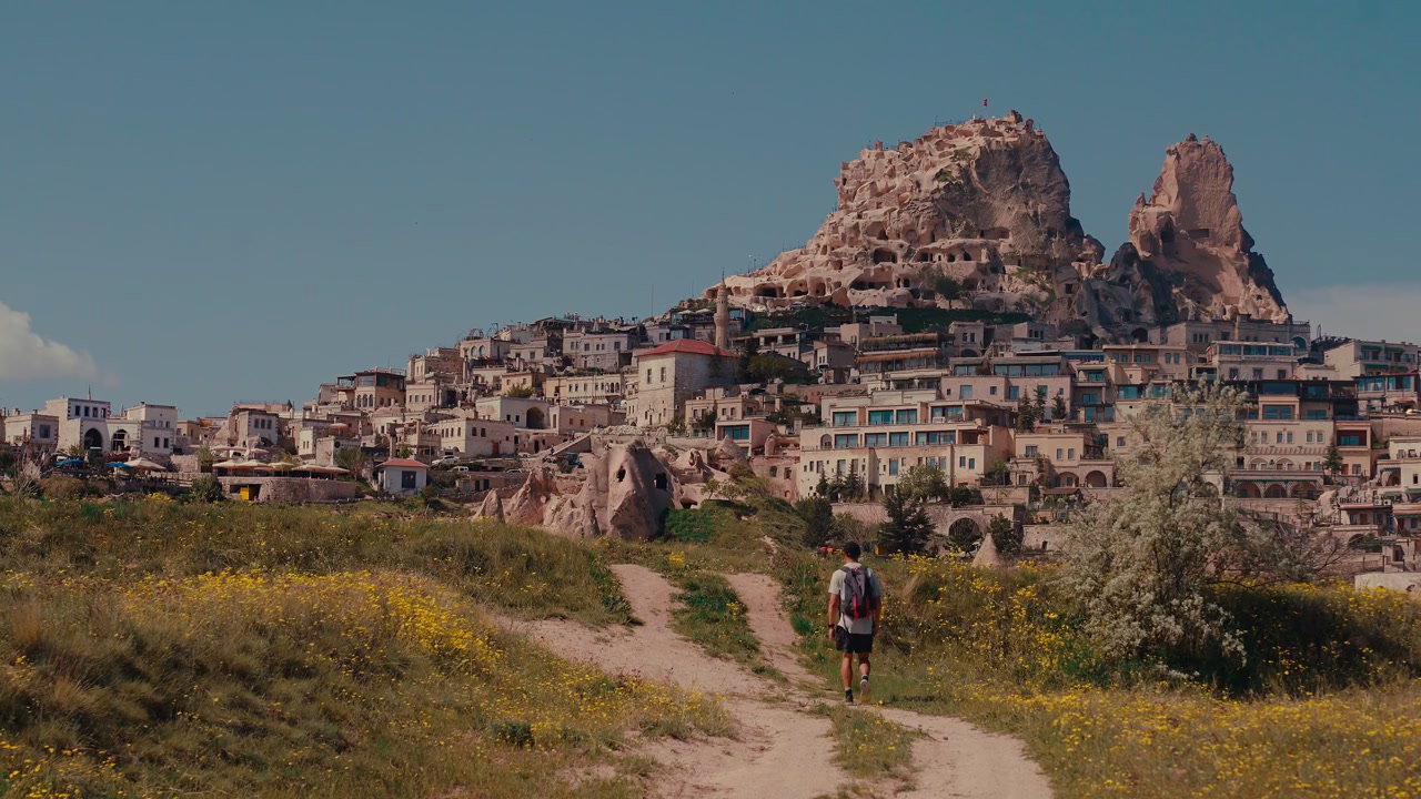 Traveler Approaches Uchisar Castle Cappadocia