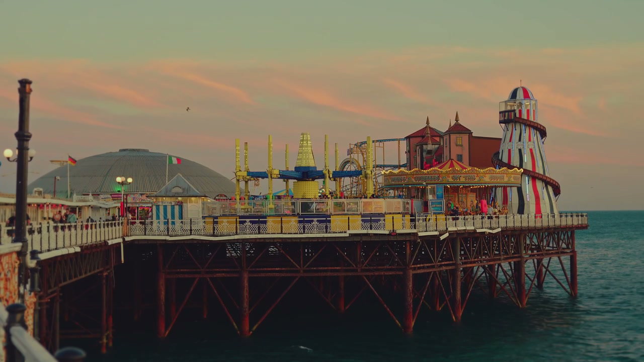 Brighton Pier Amusement Rides at Sunset