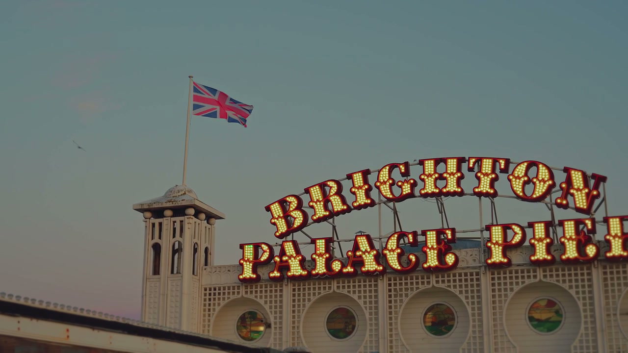 Brighton Palace Pier Sign with Union Jack Flag
