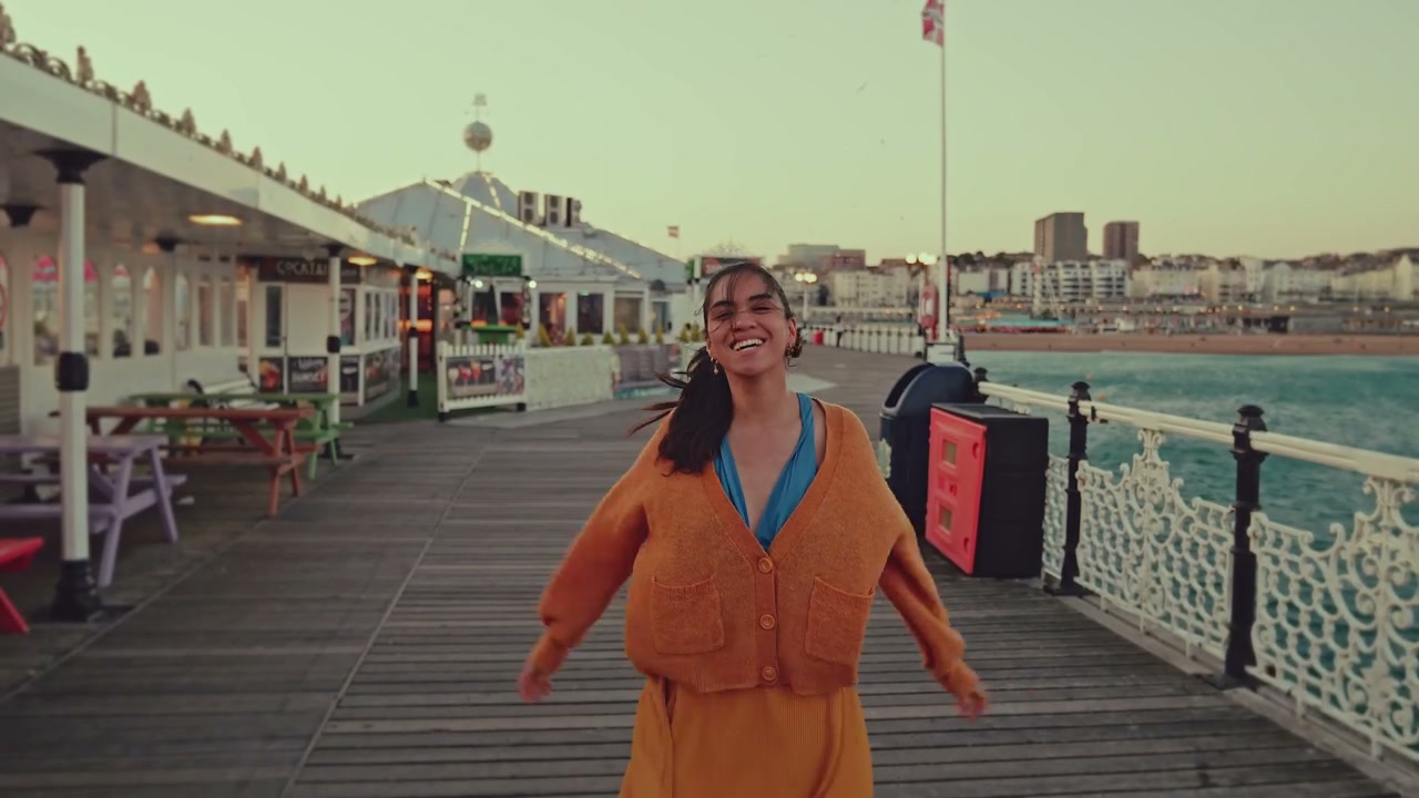 Young Woman Happy on Brighton Pier