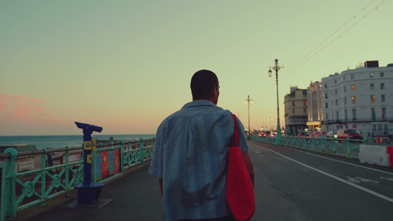 Person Walking on Brighton Promenade